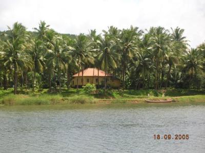 The river, the boat and the house